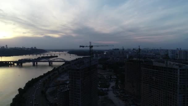 Aerial view of the construction of a new modern residential complex near the river, Kyiv, Ukraine — Wideo stockowe
