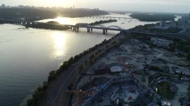 Aerial view of the construction of a new modern residential complex near the river, Kyiv, Ukraine