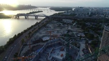 Aerial view of the construction of a new modern residential complex near the river, Kyiv, Ukraine