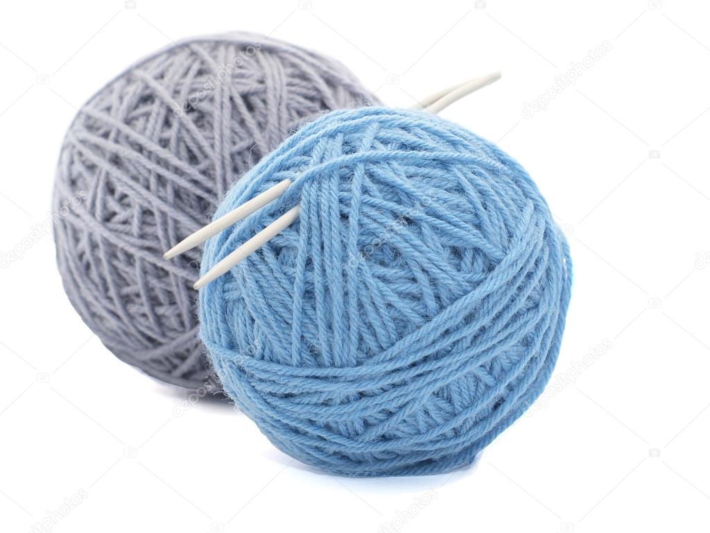 Two skeins of yarn on white background