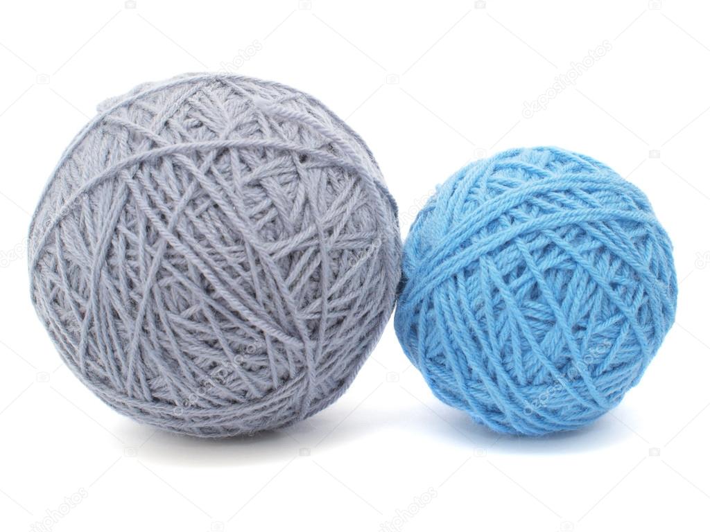 Two skeins of yarn on white background
