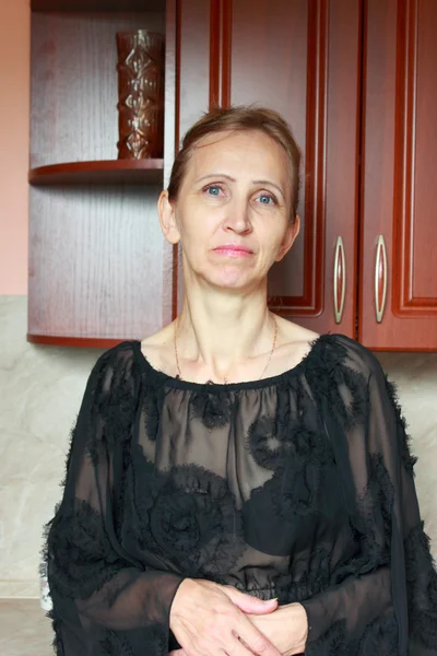 A woman in a black dress — Stock Photo, Image