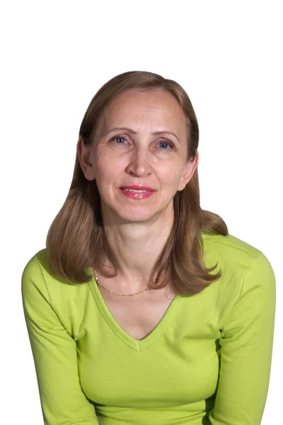 A woman in a green blouse on a white background — Stock Photo, Image