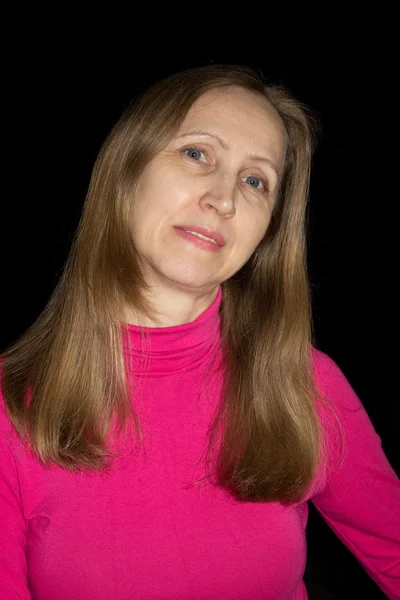 En kvinde i en rød bluse - Stock-foto