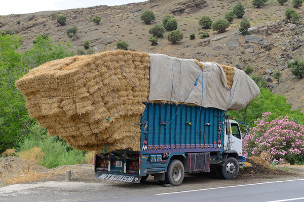 Overloaded truck staying on road