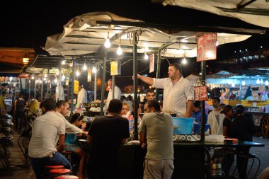 People sells food in Jemaa el Fna Square clipart