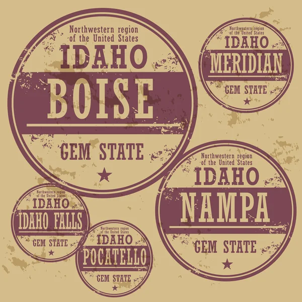Grunge rubber stamp set with names of Idaho cities — Stock Vector