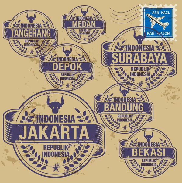 Grunge timbro di gomma con i nomi delle città Indonesia — Vettoriale Stock