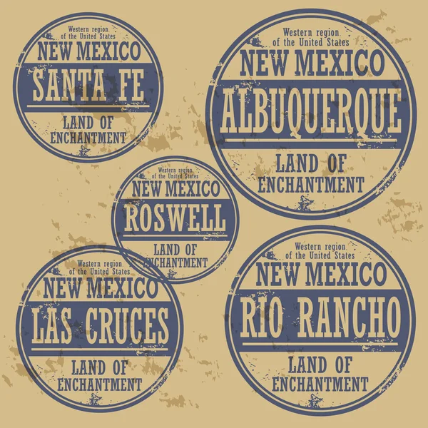 Grunge rubber stamp set with names of New Mexico cities — Stock Vector