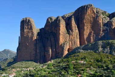 The Mallos de Riglos, set of conglomerate rock formations near H clipart