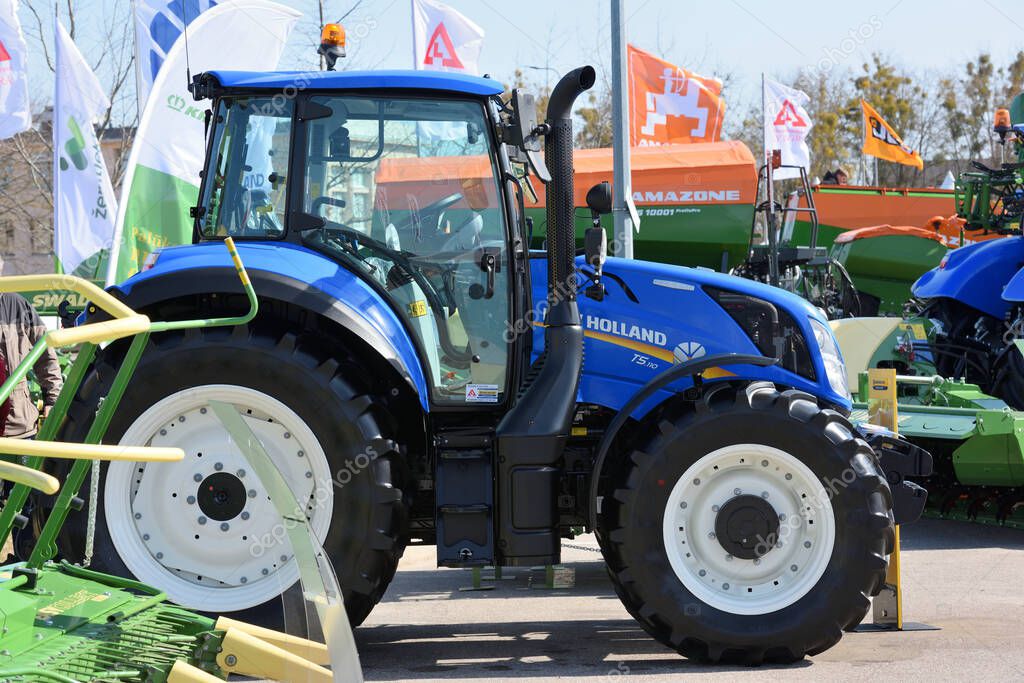 Kaunas, Lithuania - March 31, 2022: New Holland T5 tractor vehicle at International Agricultural Exhibition in Kaunas, Lithuania.