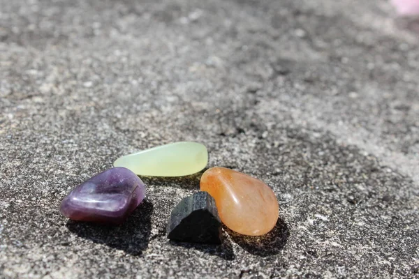 calcite, amethyst, jade, and tourmaline healing stones
