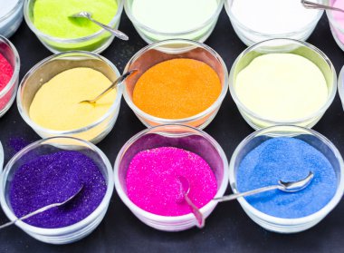 multicolored sand in the beakers clipart