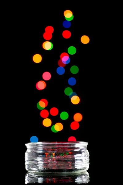 Jar and colorful bokeh — Stock Photo, Image