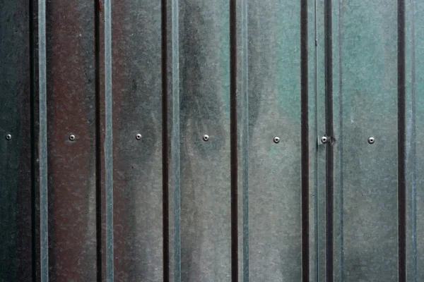 Shining ridged metal fence — Stock Photo, Image