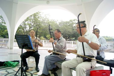 Shenzhen china: pull the erhu old clipart