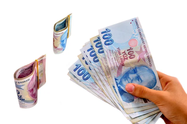 Turkiska lira hölls på en vit bakgrund — Stockfoto