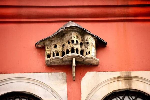 Made on the home window ottoman bird palace — Stock Photo, Image