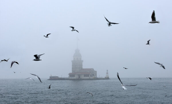 Maiden's Tower in foggy morning Istanbul, Turkey