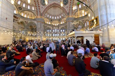 Muslims pray in the mosque Fatih clipart
