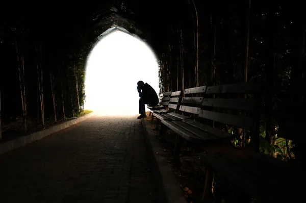 Depressed man sitting on the bench — Stock Photo, Image