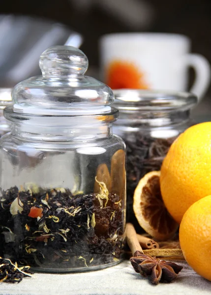 Tea, cinnamon sticks and dry orange — Stock Photo, Image