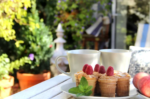 Tasty waffles and beautiful terrace — Stock Photo, Image