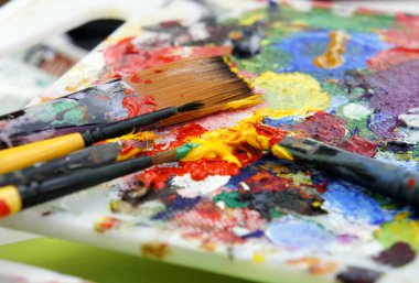 Art palette and paintbrushes