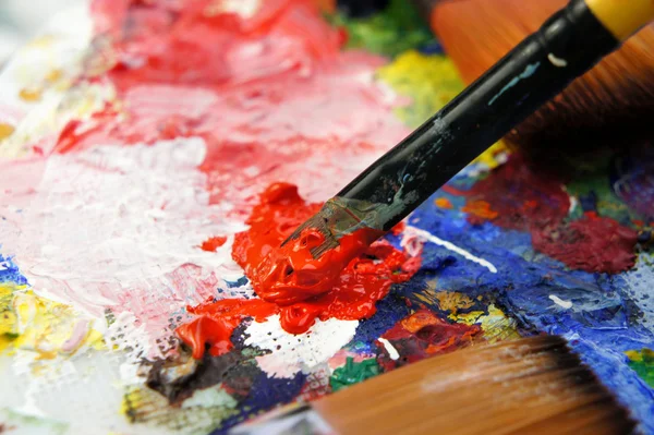Art palette and paintbrushes