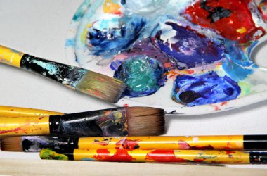 Art palette and paintbrushes