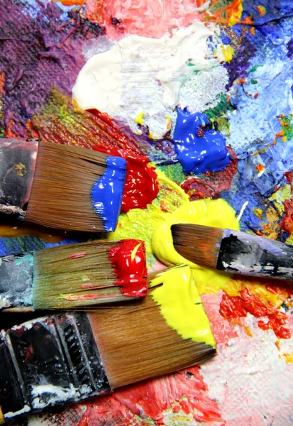 Vivid strokes and paintbrushes — Stock Photo, Image