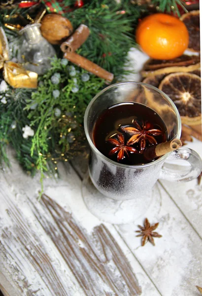 Traditional Christmas punch on the wooden background — Stock Photo, Image