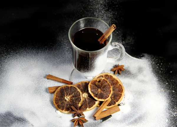 Traditional Christmas punch on the black background — Stock Photo, Image