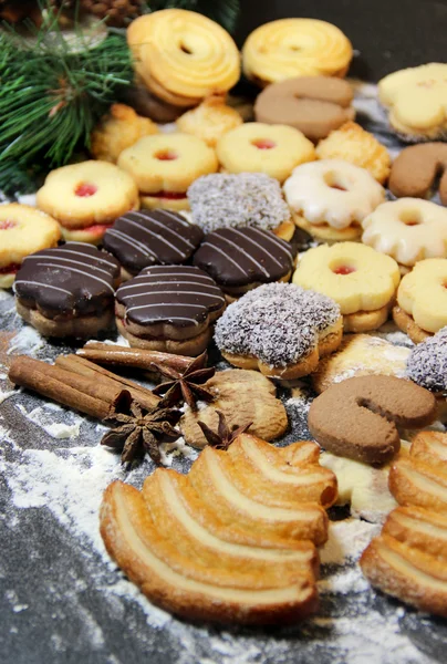 Mix of Christmas cookies with cinnamon on the table — Stock Photo, Image