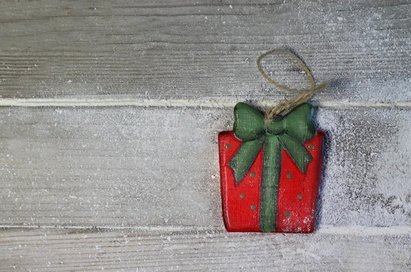 Beautiful toy present box on the wooden background — Stock Photo, Image