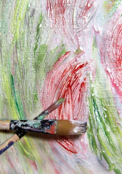 Art palette, paintbrushes and picture with flowers — Stock Photo, Image