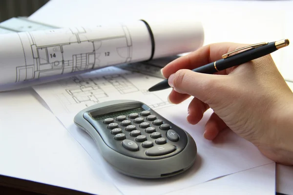 Architecture project on the office table with tools and keys — Stock Photo, Image