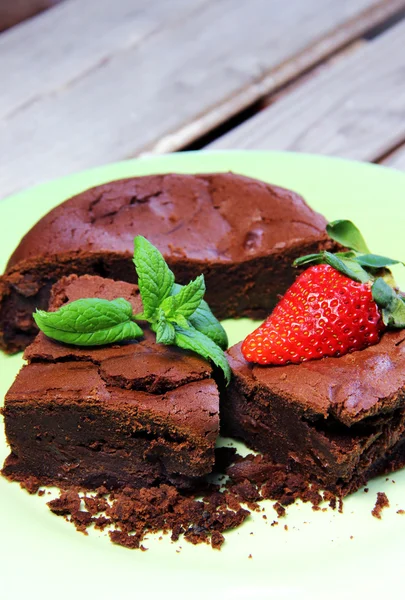 Pieces of brownie with strawberry — Stock Photo, Image
