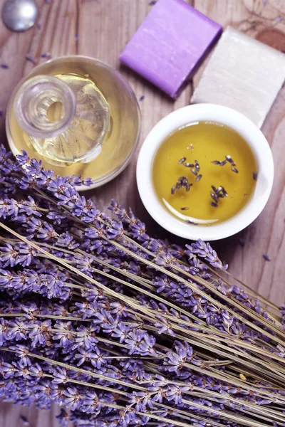 Mix of lavender flowers and cosmetic — Stock Photo, Image