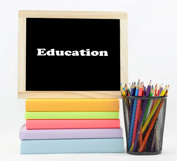 Education Text Chalkboard On Colored Books With Colored Pencils — Stock Photo, Image