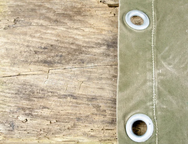 Lienzo en mesa de madera —  Fotos de Stock