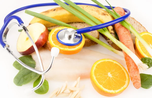 Aliments sains avec stéthoscope — Photo