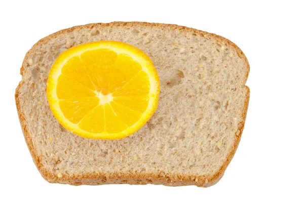 Pane integrale di frumento e fetta di limone — Foto Stock