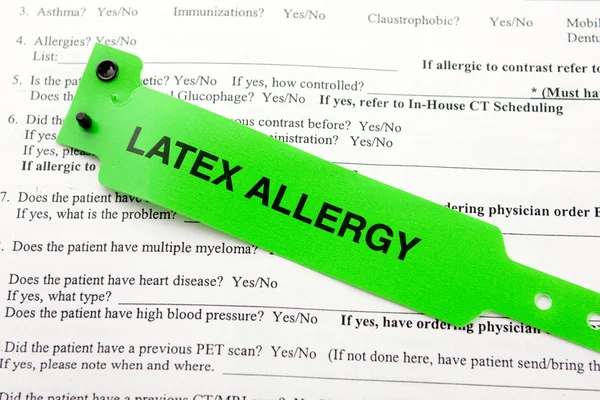 Latex allergi och pappersarbete — Stockfoto