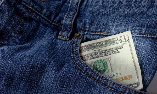 Geld in front pocket — Stockfoto