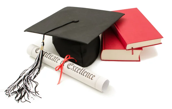 Grad hat e diploma com livro isolado em branco — Fotografia de Stock