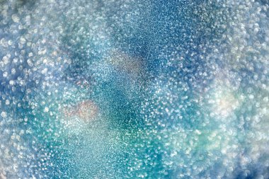 Şenlikli, pırıl pırıl noel ışıkları. Tatiller için bulanık bej soyut arkaplan