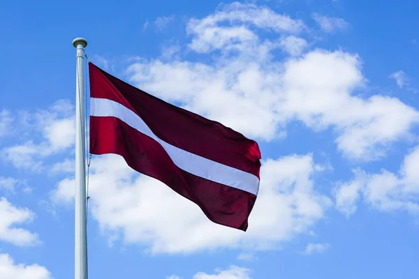Latvian State Flag Mast Waving Wind Blue Sky White Clouds — Φωτογραφία Αρχείου