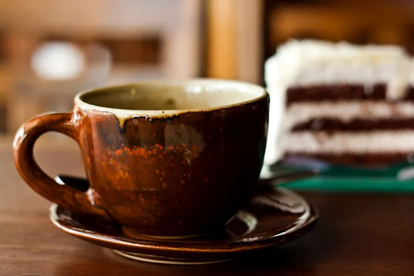 Chocolate cake with a cup of coffee — Stock Photo, Image