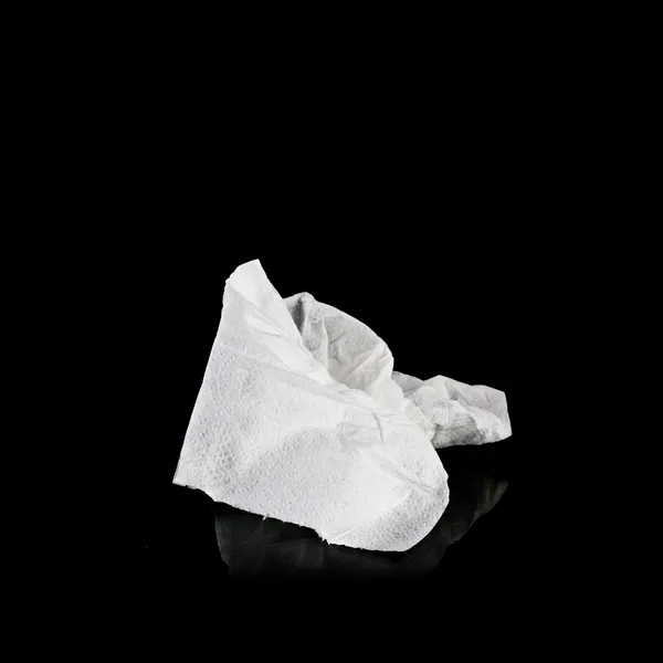 Crumpled tissue paper with reflect isolated on black background — Stock Photo, Image